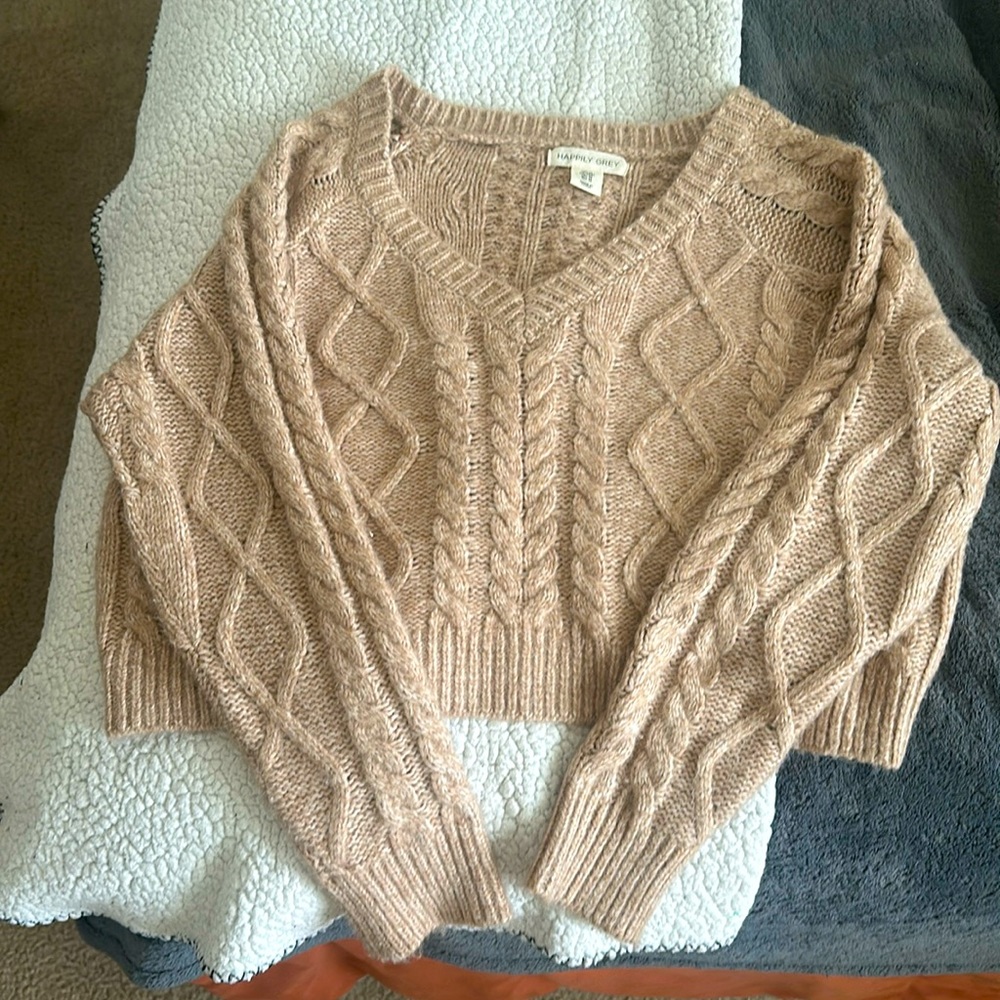 A cropped sweater that you can dress up or down to wear to any occasion!